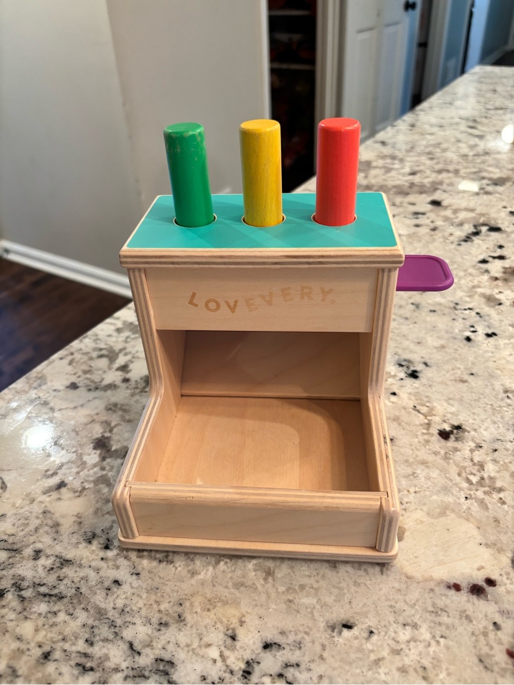Lovevery wooden peg drop from the thinker play kit